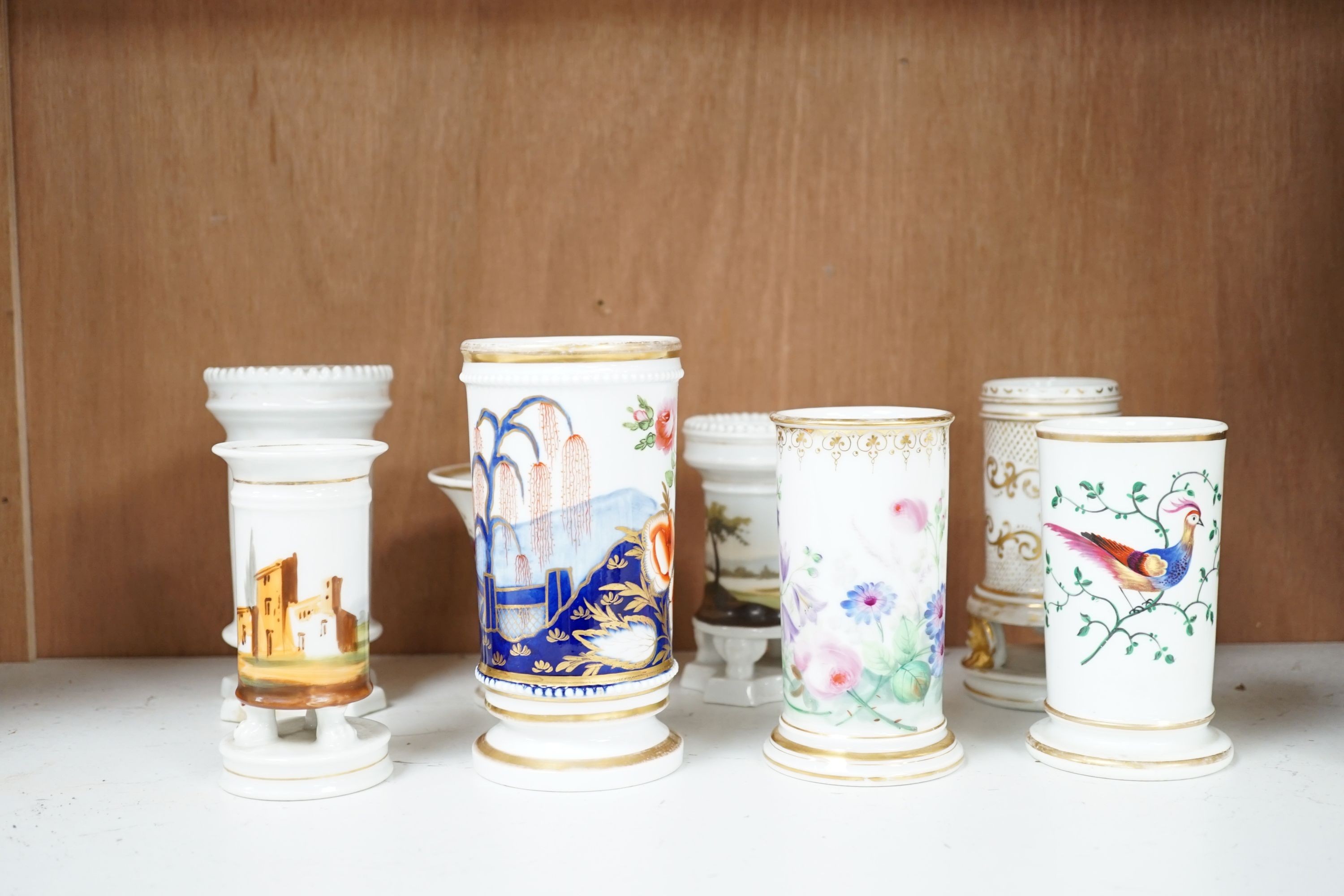 Ten various 19th century porcelain spill vases, tallest 14cm.